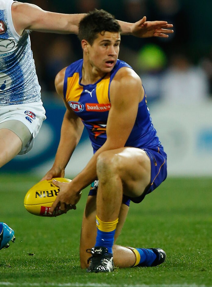 AFL 2015 Rd 10 - North Melbourne v West Coast HOBART, AUSTRALIA - JUNE 07: Liam Duggan of the Eagles attempts to hand ball during the 2015 AFL round ten match between the North Melbourne Kangaroos and the West Coast Eagles at Blundstone Arena, Hobart on June 7, 2015. (Photo by Sean Garnsworthy/AFL Media)